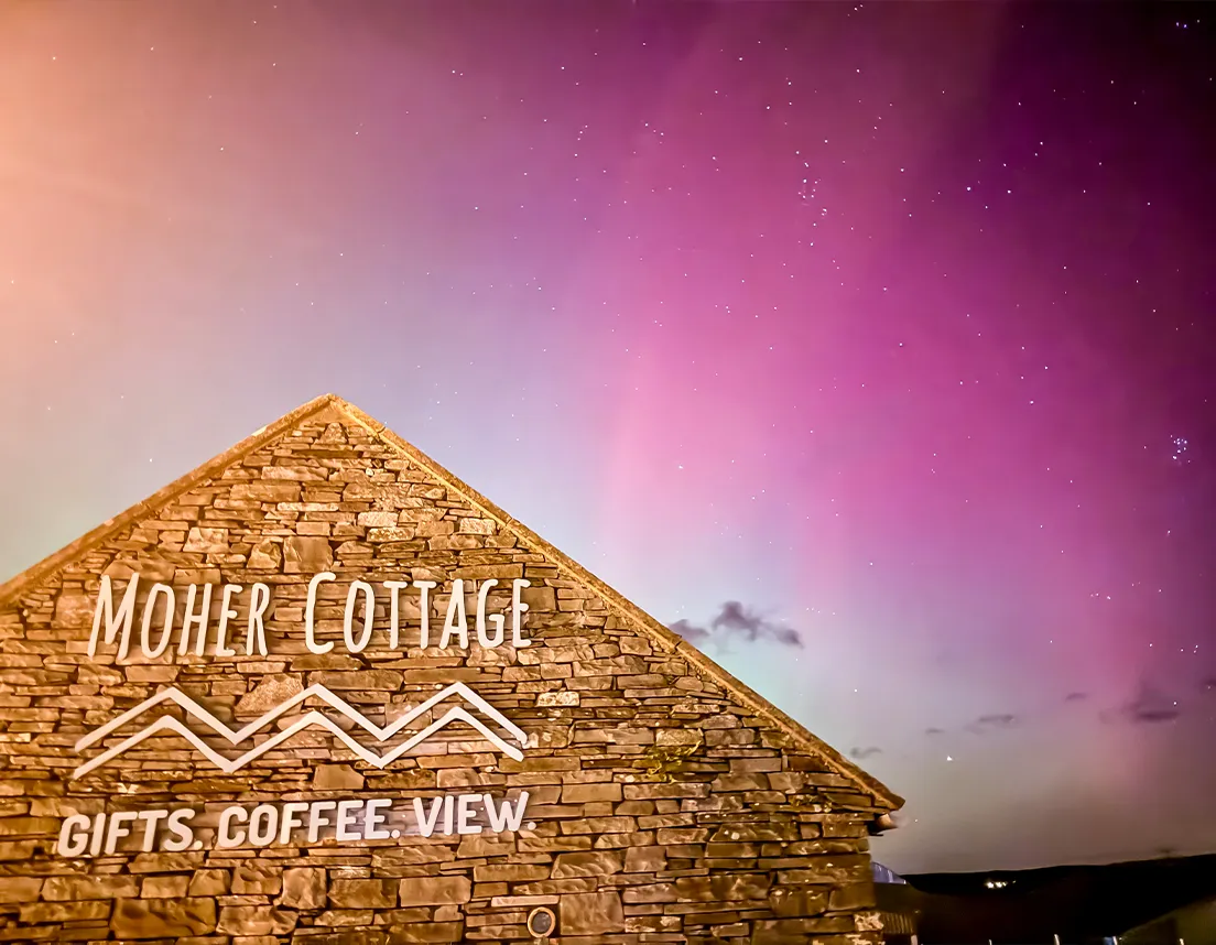 Moher Cottage with aurora borealis visible