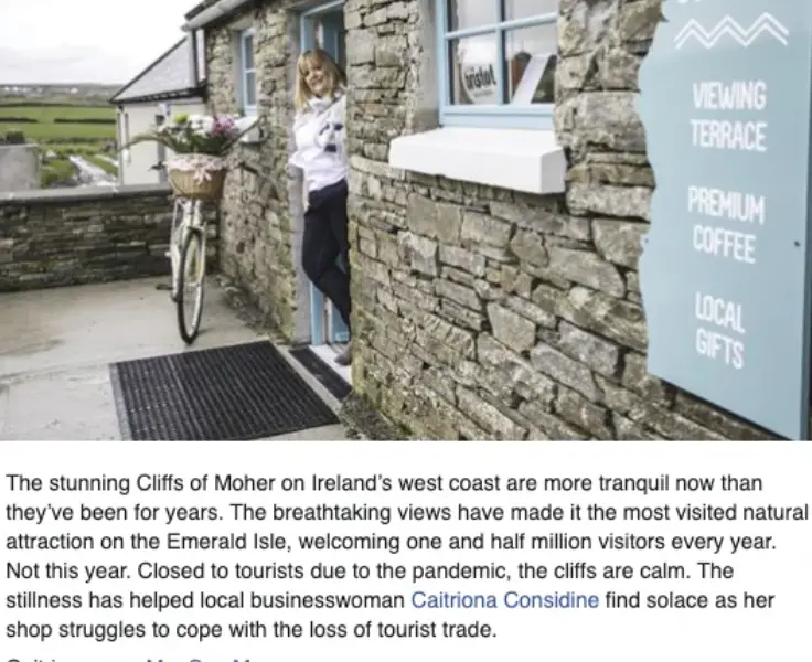 woman standing in doorway text